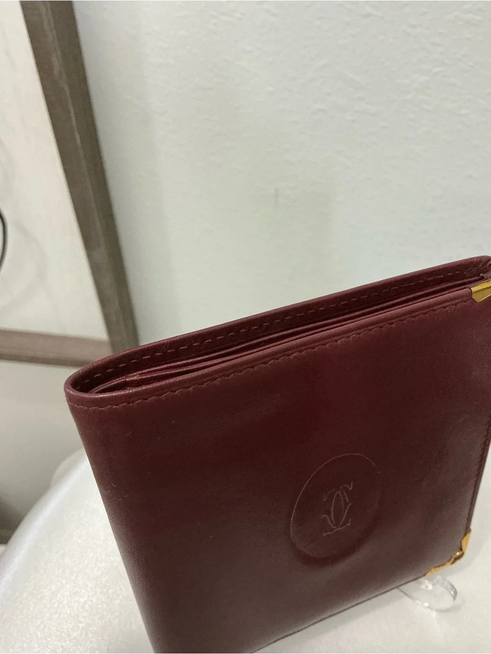 Preowned Vintage Cartier Burgundy Leather Bifold Wallet with 2 COAs